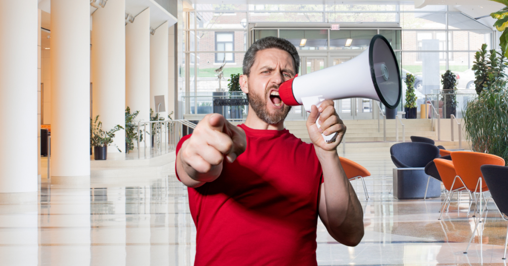 Man shouting to new employees to join the business.