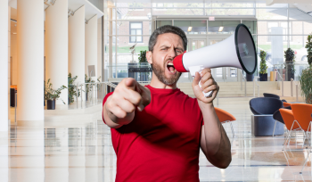 Man shouting to new employees to join the business.